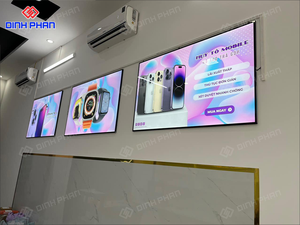 Tranh điện cửa hàng điện thoại tại Đắk Lắk